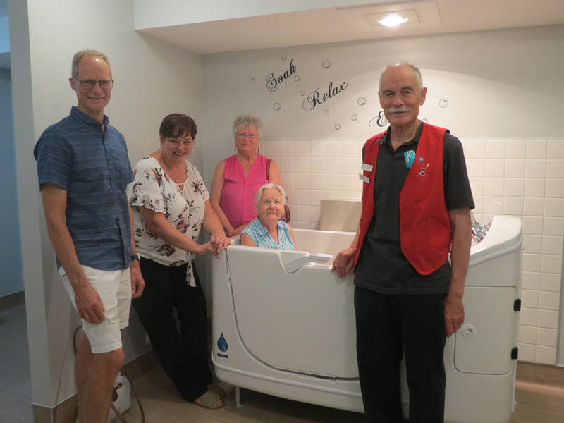 Testing out the new walk-in tub recently installed at Angus Place, as funded by the Auxiliary
